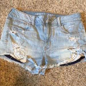 Distressed stretch jean shorts